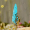 Imported gold metal Nikkah pen with a gold-splattered turquoise feather