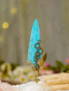 Imported gold metal Nikkah pen with a gold-splattered turquoise feather