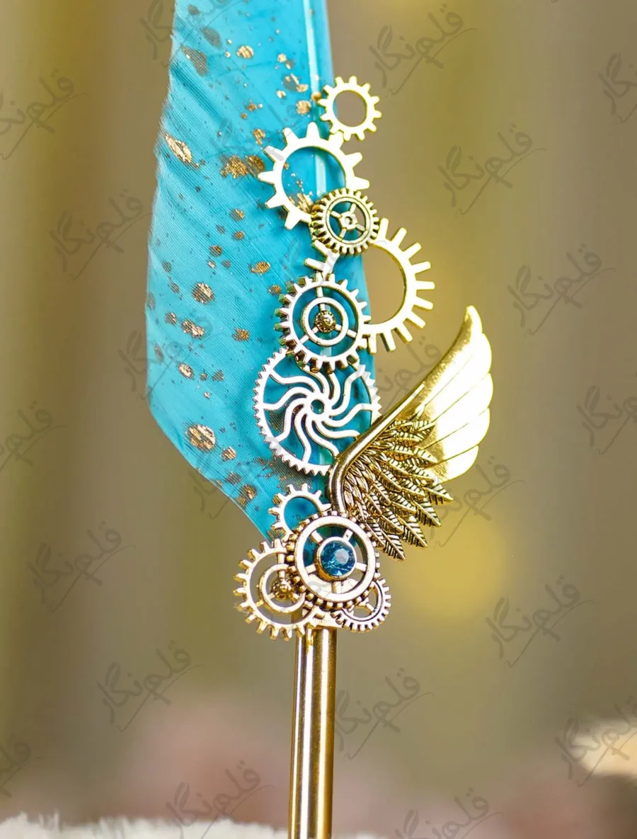 Side angle view of the turquoise feather showing gold metallic paint spots