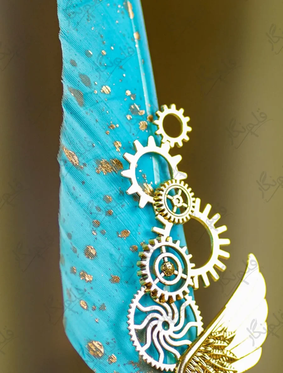 Detailed shot of the tiny blue rhinestone set in a gold gear ornament