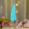 Imported gold metal Nikkah pen with a gold-splattered turquoise feather