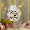 Side angle of the textured gold and silver ribbon handle with rhinestone spiral