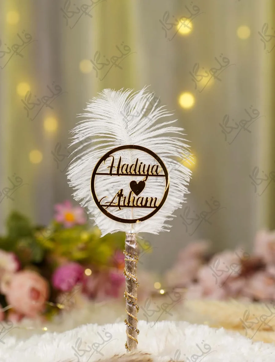 Side angle of the textured gold and silver ribbon handle with rhinestone spiral