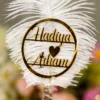 Personalized version of the pen showing gold mirror acrylic couple name circle with Hadiya and Arham