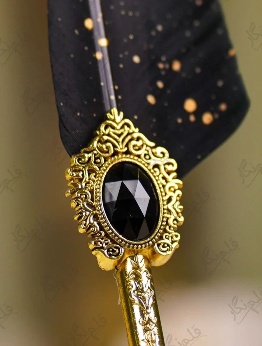 Ornate gold metal handle showing detailed scrollwork