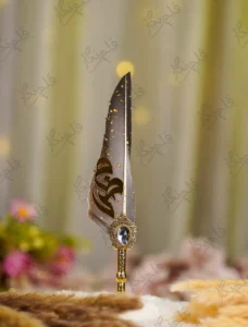 Detailed shot of the custom gold mirror acrylic calligraphy script on the feather