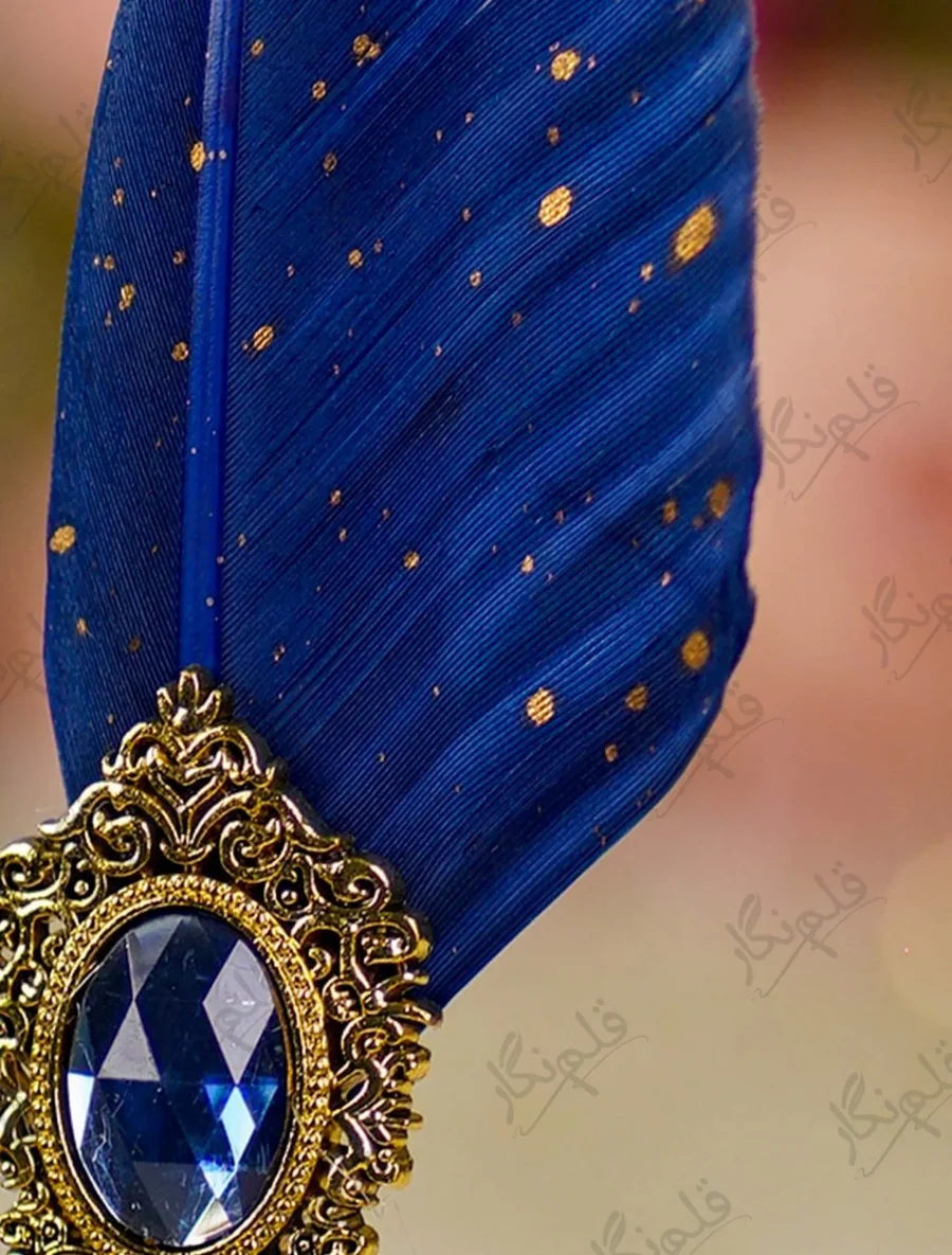 Detailed shot of the royal blue oval gemstone in the vintage gold frame
