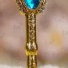 Upper tip of the teal quill feather close up showing gold splatters