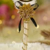 Customized version showing circular gold acrylic couple name circle on the feather