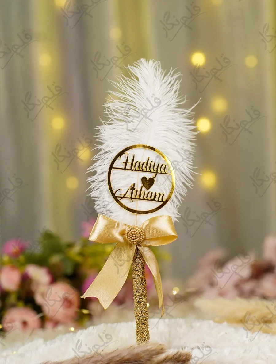 Front view of the complete Gold Ribbon Bow White Feather Nikkah Pen