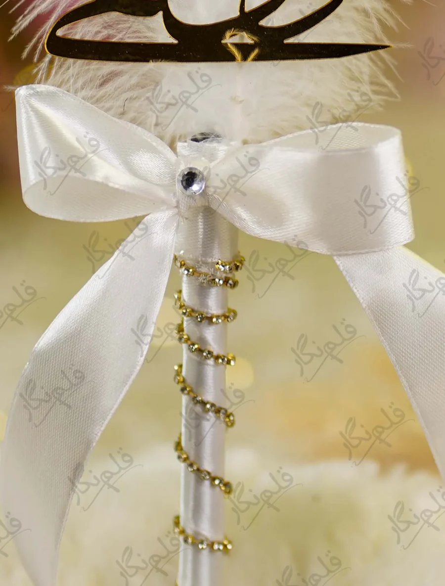 High angle shot showing the white satin ribbon and gold rhinestone chain wrap