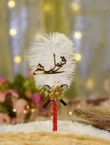 Handmade white feather Nikkah pen with a red handle and black bow