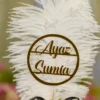 Customized version showing circular gold acrylic couple name circle on the feather